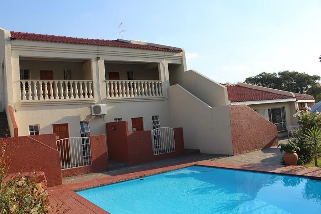 Flamboyant Guest Lodge Johannesburg Bagian luar foto